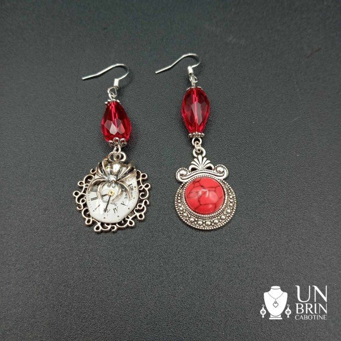 Boucles d'oreilles rouges, asymétriques